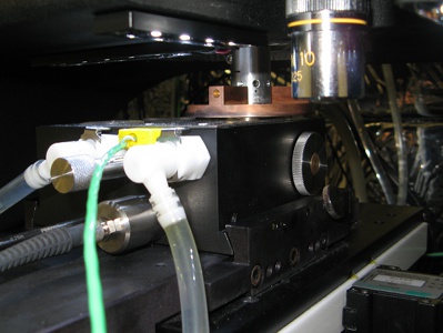 Laser heater tray mounted in nanoindenter